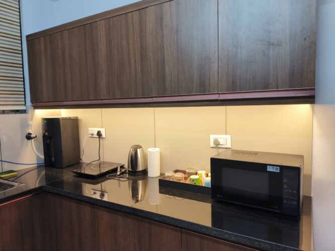 Fully Equipped Kitchenette with Microwave Oven, Water Purifier, Induction Stove