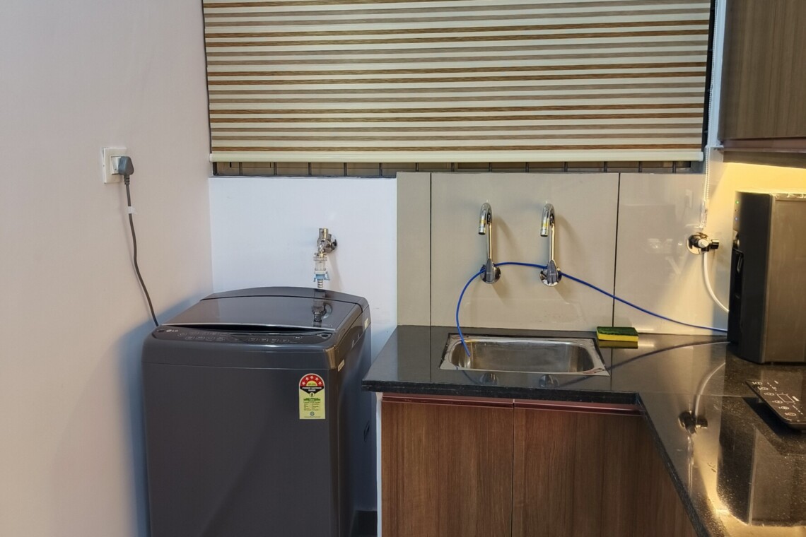 Fully Automatic Washing Machine in the Kitchen