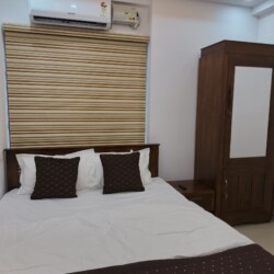 AC Bed room with Queen Bed & wardrobe