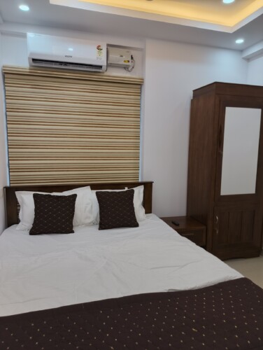 AC Bed room with Queen Bed & wardrobe